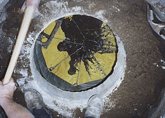 Debris Catcher holding broken concrete and brick during a casting adjustment
